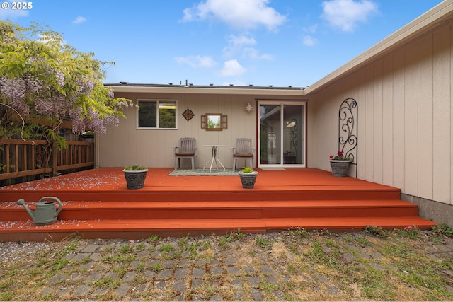 wooden deck featuring fence