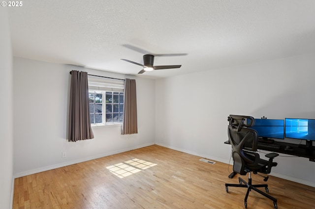 243 N 30th Ct, Cornelius, OR 97113 - office area featuring wood finished floors, ceiling fan, and a textured ceiling