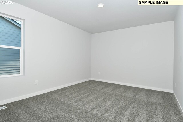 5318 NE 68th St, Vancouver, WA 98661 - spare room with baseboards, visible vents, and carpet flooring