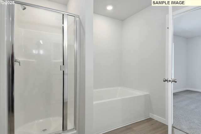 5318 NE 68th St, Vancouver, WA 98661 - full bath with a shower stall, baseboards, wood finished floors, and a garden tub