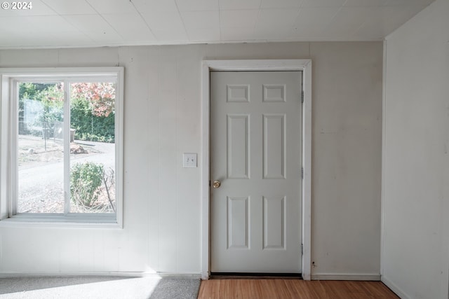 doorway to outside featuring wood finished floors