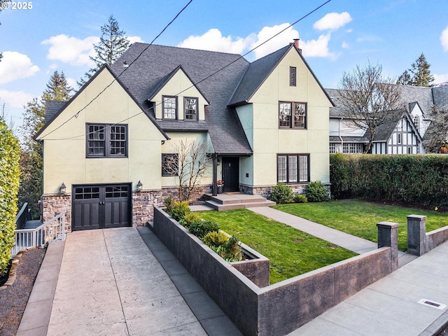 view of front facade featuring stucco siding, stone siding, and an attached garage