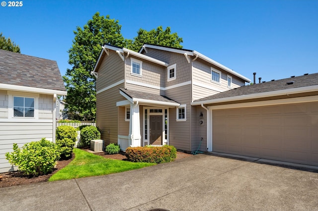 17146 SE 23rd Dr Unit 20, Vancouver, WA 98683 - view of front of house featuring concrete driveway, a garage, and central AC