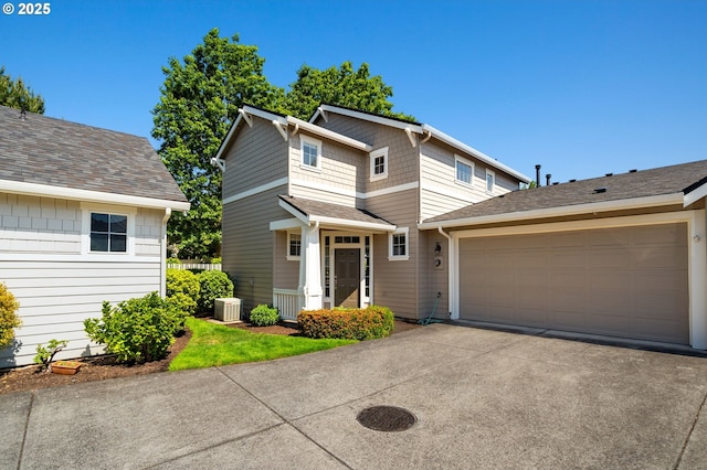 17146 SE 23rd Dr Unit 20, Vancouver, WA 98683 - view of front of house with a garage, central AC, and driveway