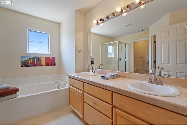 17146 SE 23rd Dr Unit 20, Vancouver, WA 98683 - bathroom with a stall shower, double vanity, toilet, and a garden tub