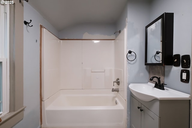 bathroom with vanity and shower / bathing tub combination