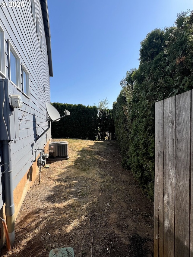 view of yard featuring cooling unit