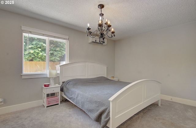11204 NE 85th Cir, Vancouver, WA 98662 - bedroom featuring a chandelier, carpet, and a textured ceiling