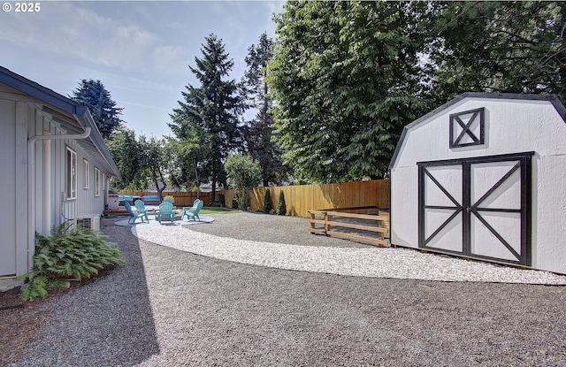 11204 NE 85th Cir, Vancouver, WA 98662 - fenced backyard with a patio area and a storage shed