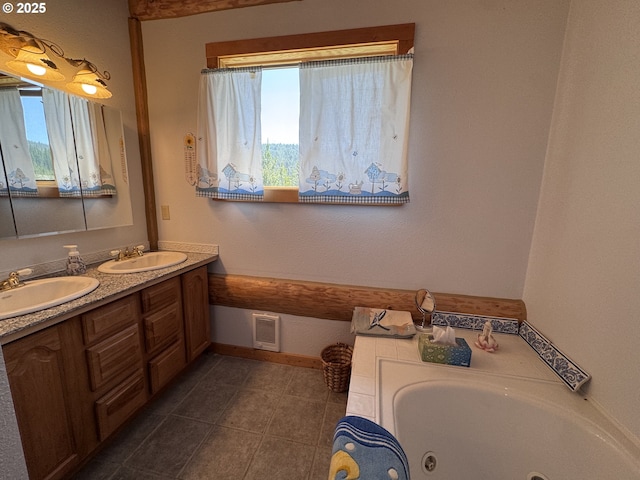 44552 Red Boy Rd, Granite, OR 97877 - bathroom featuring double vanity, a tub with jets, and tile patterned flooring