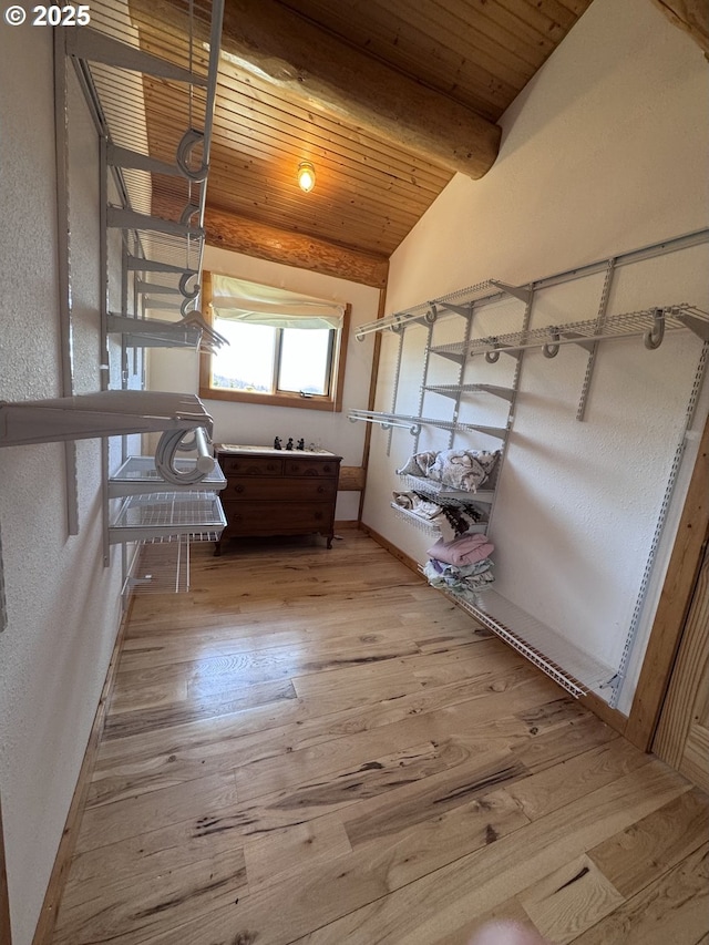 44552 Red Boy Rd, Granite, OR 97877 - bedroom with wood ceiling, light wood-style flooring, and a textured wall