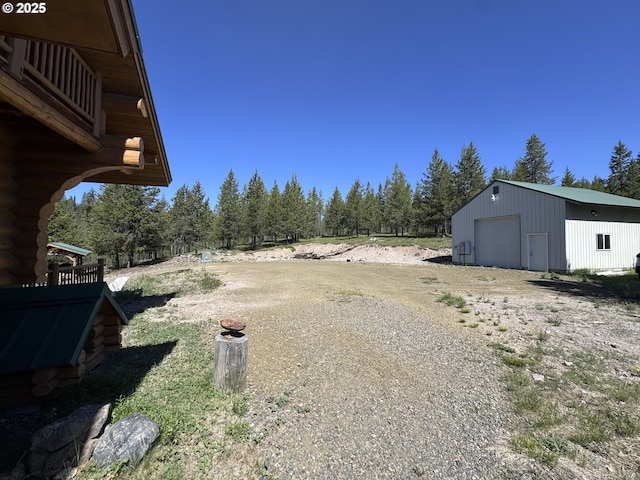 44552 Red Boy Rd, Granite, OR 97877 - view of yard featuring a garage and an outbuilding