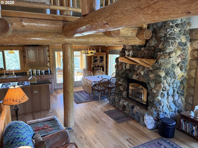 44552 Red Boy Rd, Granite, OR 97877 - living room with rustic walls and light wood finished floors