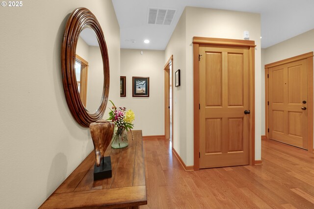 123 S Hemlock St # 201, Cannon Beach, OR 97110 - hall with light wood finished floors and recessed lighting