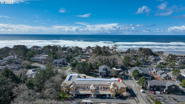 123 S Hemlock St # 201, Cannon Beach, OR 97110 - aerial perspective of suburban area featuring a large body of water