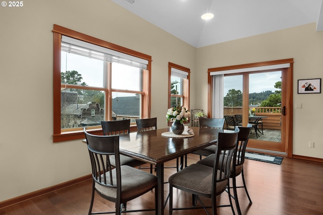 123 S Hemlock St # 201, Cannon Beach, OR 97110 - dining space featuring wood finished floors and lofted ceiling