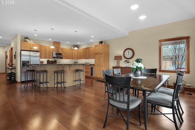 123 S Hemlock St # 201, Cannon Beach, OR 97110 - dining space featuring dark wood-style floors and recessed lighting