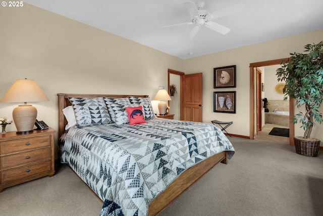 123 S Hemlock St # 201, Cannon Beach, OR 97110 - carpeted bedroom featuring ceiling fan and ensuite bathroom
