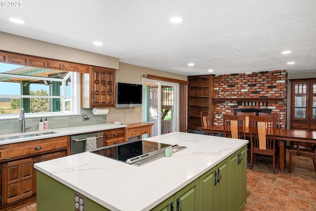 41266 Manitau Rd SE, Stayton, OR 97383 - kitchen featuring green cabinetry, stainless steel dishwasher, a kitchen island, electric stovetop, and plenty of natural light