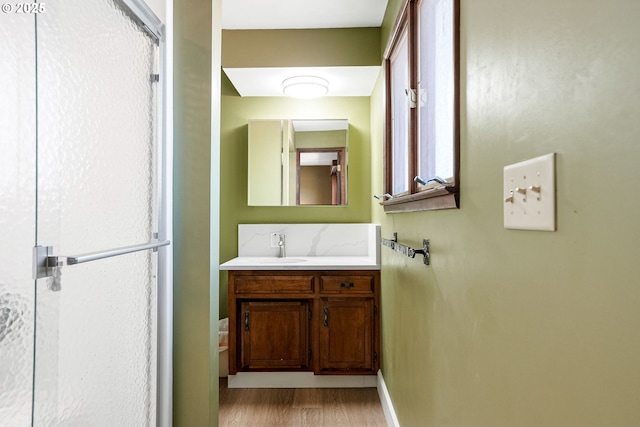 41266 Manitau Rd SE, Stayton, OR 97383 - bathroom featuring vanity and wood finished floors