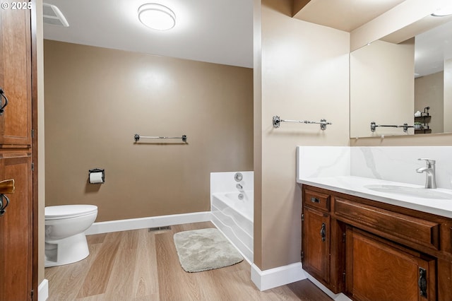 41266 Manitau Rd SE, Stayton, OR 97383 - bathroom with wood finished floors, a bath, and vanity