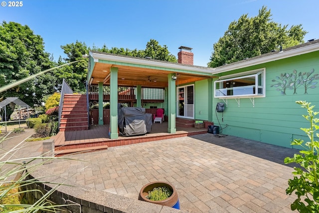 41266 Manitau Rd SE, Stayton, OR 97383 - view of patio with a deck, ceiling fan, stairs, and grilling area
