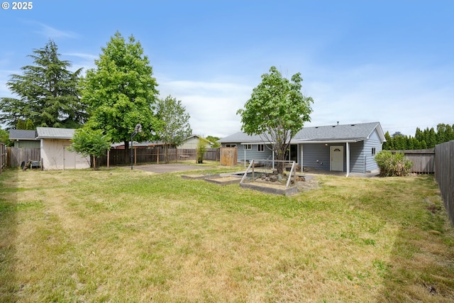 2222 34th Ave, Albany, OR 97322 - view of yard featuring a vegetable garden and a patio area