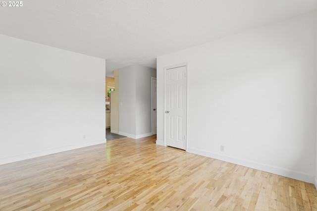2222 34th Ave, Albany, OR 97322 - spare room with wood finished floors and baseboards