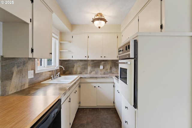 2222 34th Ave, Albany, OR 97322 - kitchen featuring white oven, open shelves, a sink, tasteful backsplash, and light countertops