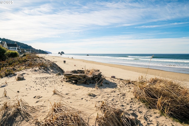 view of water feature with a beach view