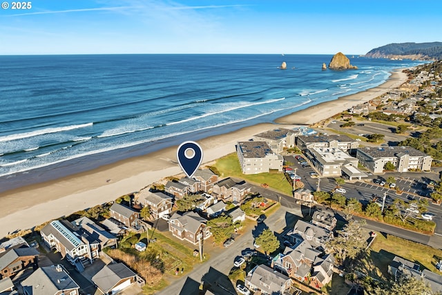 bird's eye view featuring a water view, a residential view, and a view of the beach