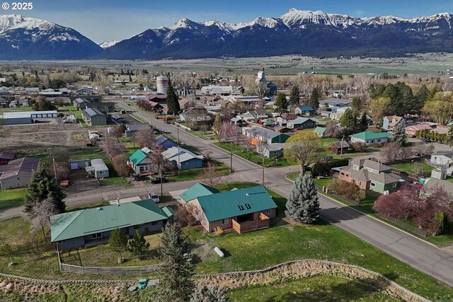 drone / aerial view with a mountain view and a residential view