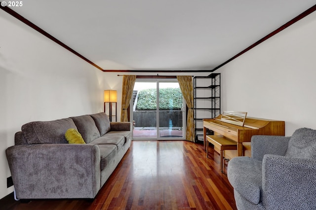 living room featuring crown molding and wood finished floors