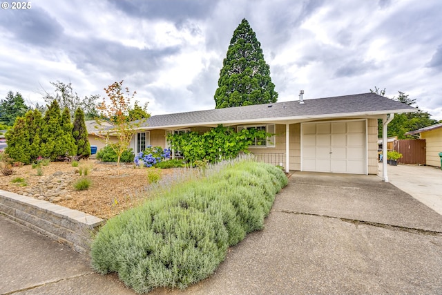 3441 SE 162nd Ave, Portland, OR 97236 - ranch-style home featuring a garage and driveway