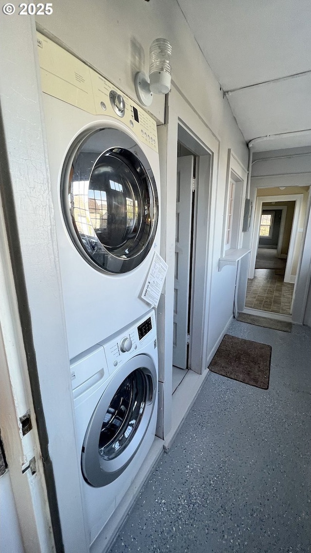 1125 16th St, Astoria, OR 97103 - clothes washing area with estacked washer and dryer
