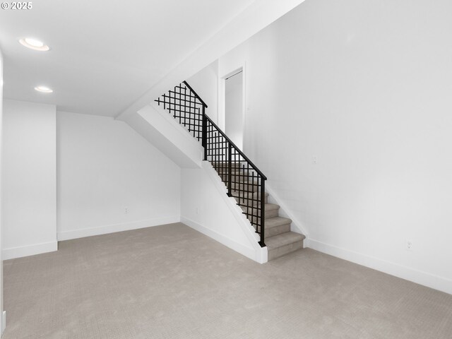 interior space featuring carpet, baseboards, and recessed lighting