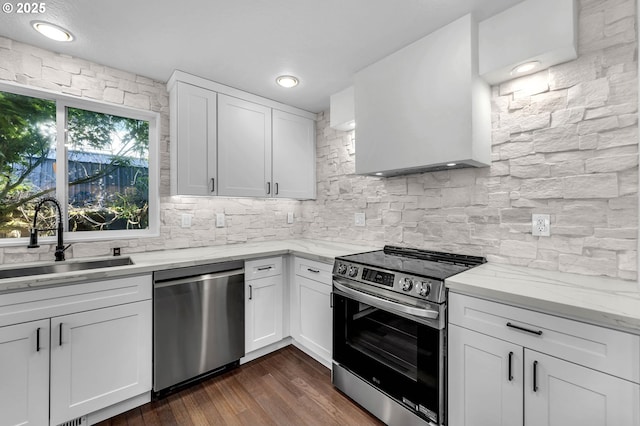 3612 NE 111th St, Vancouver, WA 98686 - kitchen featuring appliances with stainless steel finishes, a sink, decorative backsplash, and white cabinets