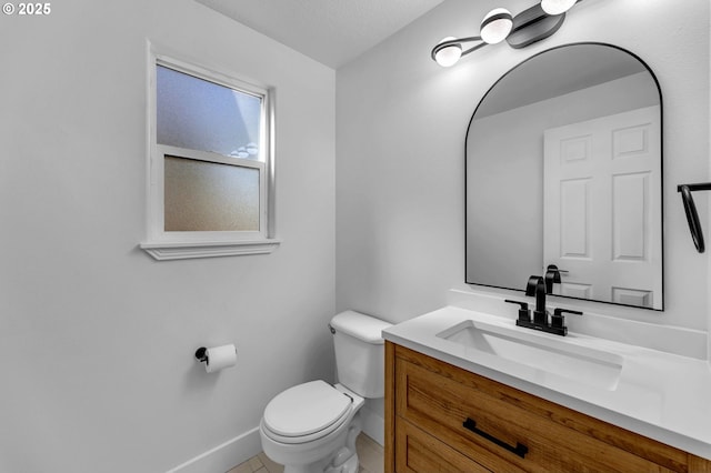 3612 NE 111th St, Vancouver, WA 98686 - bathroom with baseboards, toilet, and vanity