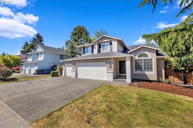 3612 NE 111th St, Vancouver, WA 98686 - view of front of property with concrete driveway, an attached garage, brick siding, and roof with shingles