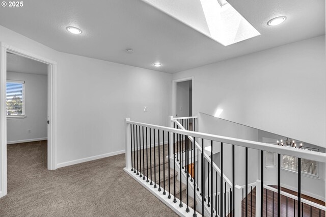 3612 NE 111th St, Vancouver, WA 98686 - corridor featuring an upstairs landing, carpet flooring, a skylight, baseboards, and recessed lighting