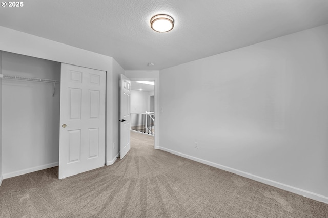 3612 NE 111th St, Vancouver, WA 98686 - unfurnished bedroom with carpet flooring, a closet, baseboards, and a textured ceiling