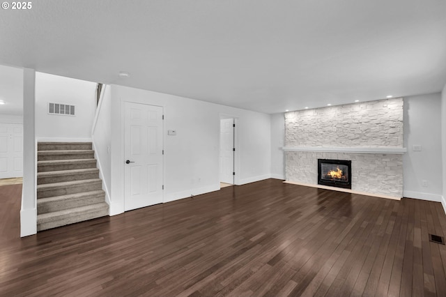 3612 NE 111th St, Vancouver, WA 98686 - unfurnished living room with wood-type flooring, a fireplace, stairway, baseboards, and recessed lighting