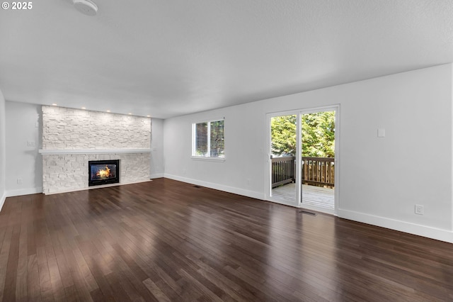 3612 NE 111th St, Vancouver, WA 98686 - unfurnished living room featuring hardwood / wood-style flooring, a fireplace, and baseboards