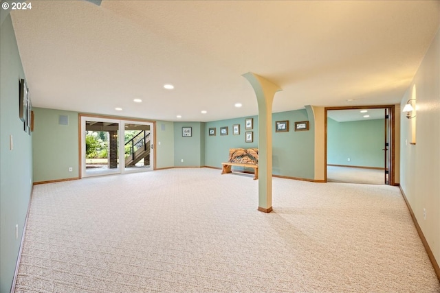 carpeted spare room with recessed lighting and baseboards