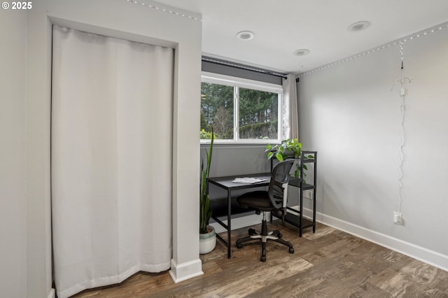 home office featuring hardwood / wood-style floors