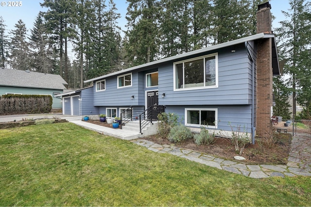 rear view of property featuring a yard