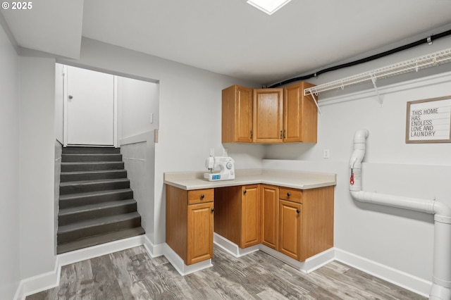 kitchen with light hardwood / wood-style flooring