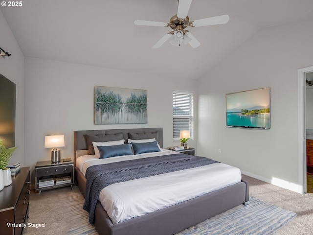 bedroom featuring a ceiling fan, baseboards, vaulted ceiling, and carpet flooring