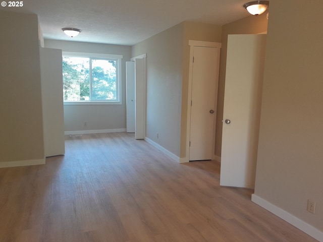 4810 SW 48th Ct, Lincoln City, OR 97367 - spare room with light wood-style flooring and baseboards