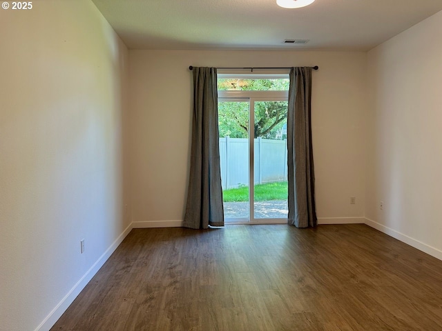 1916 SW 6th St, Battle Ground, WA 98604 - spare room featuring dark wood-type flooring and baseboards